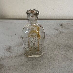 Antique Clear Glass doll e toys by Amsco bottle